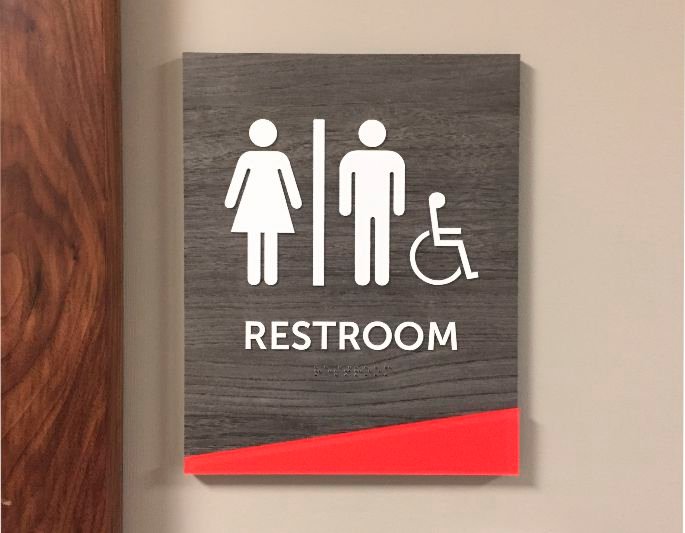 Contemporary ADA restroom sign wood grain formica for health care facility