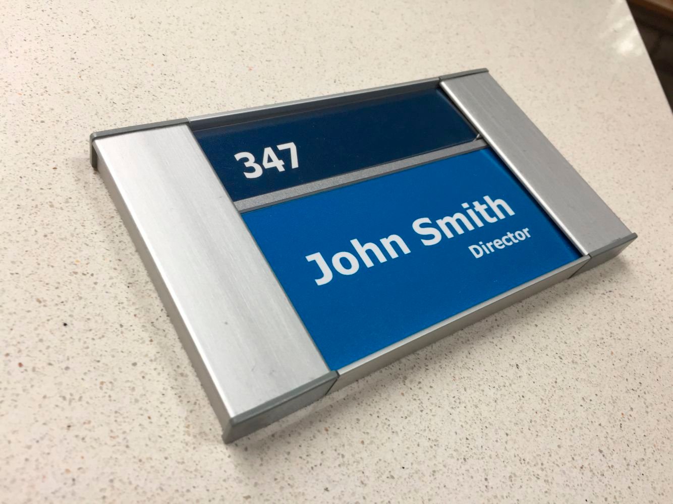 ADA room sign with a printable name insert