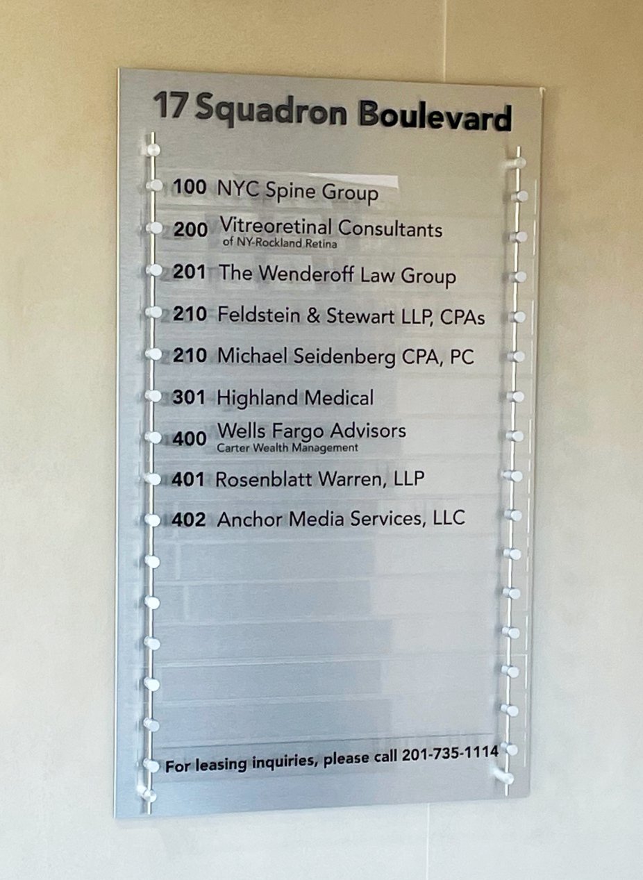 Modern Building custom directory metal standoffs