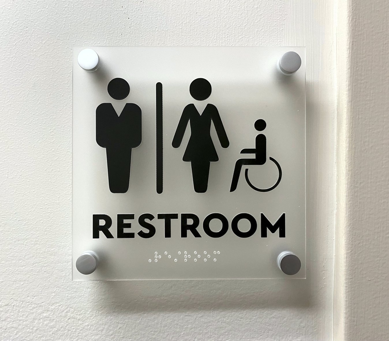 ADA compliant restroom on frosted acrylic with standoffs