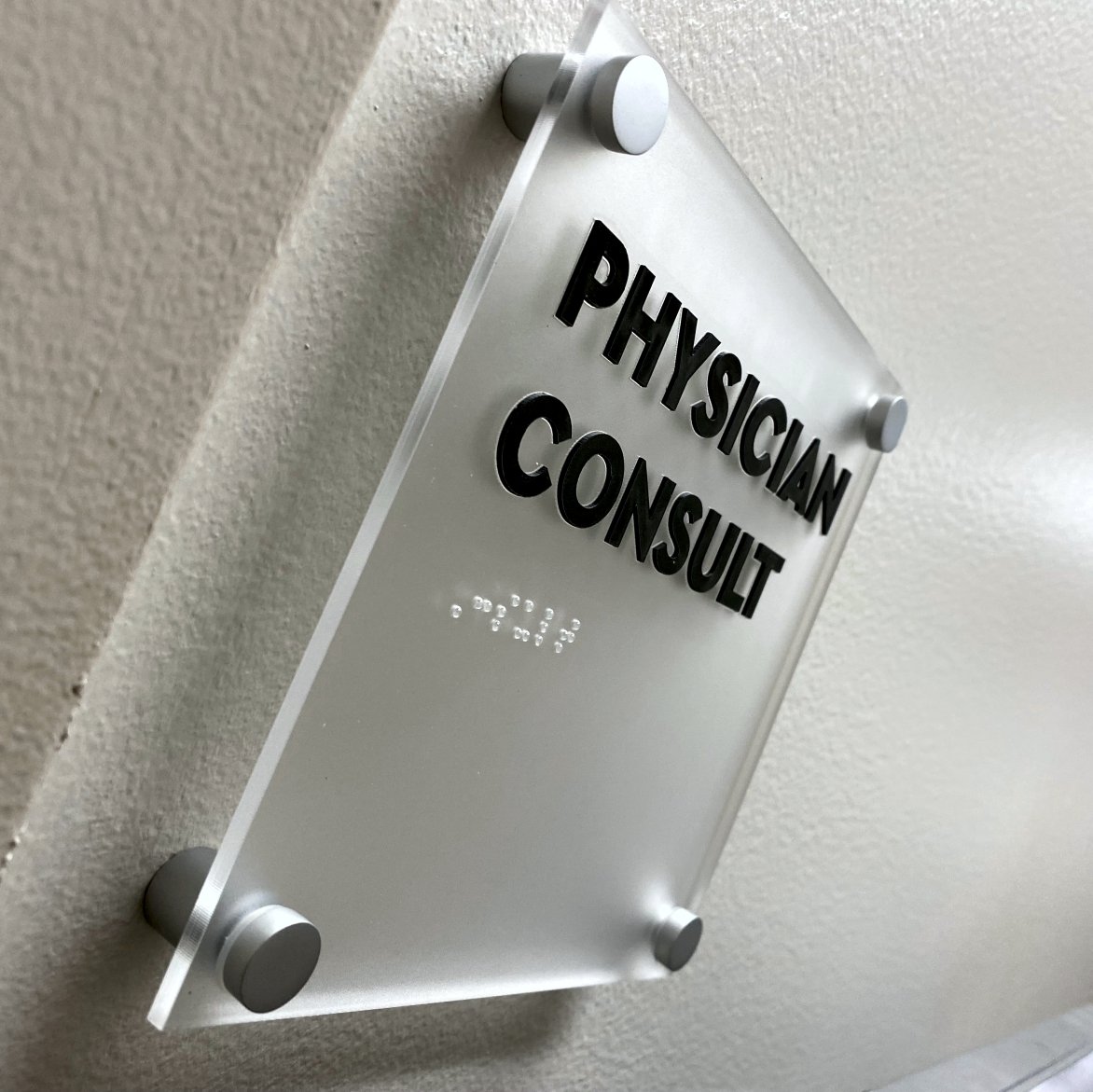 ADA compliant sign on frosted acrylic with standoffs